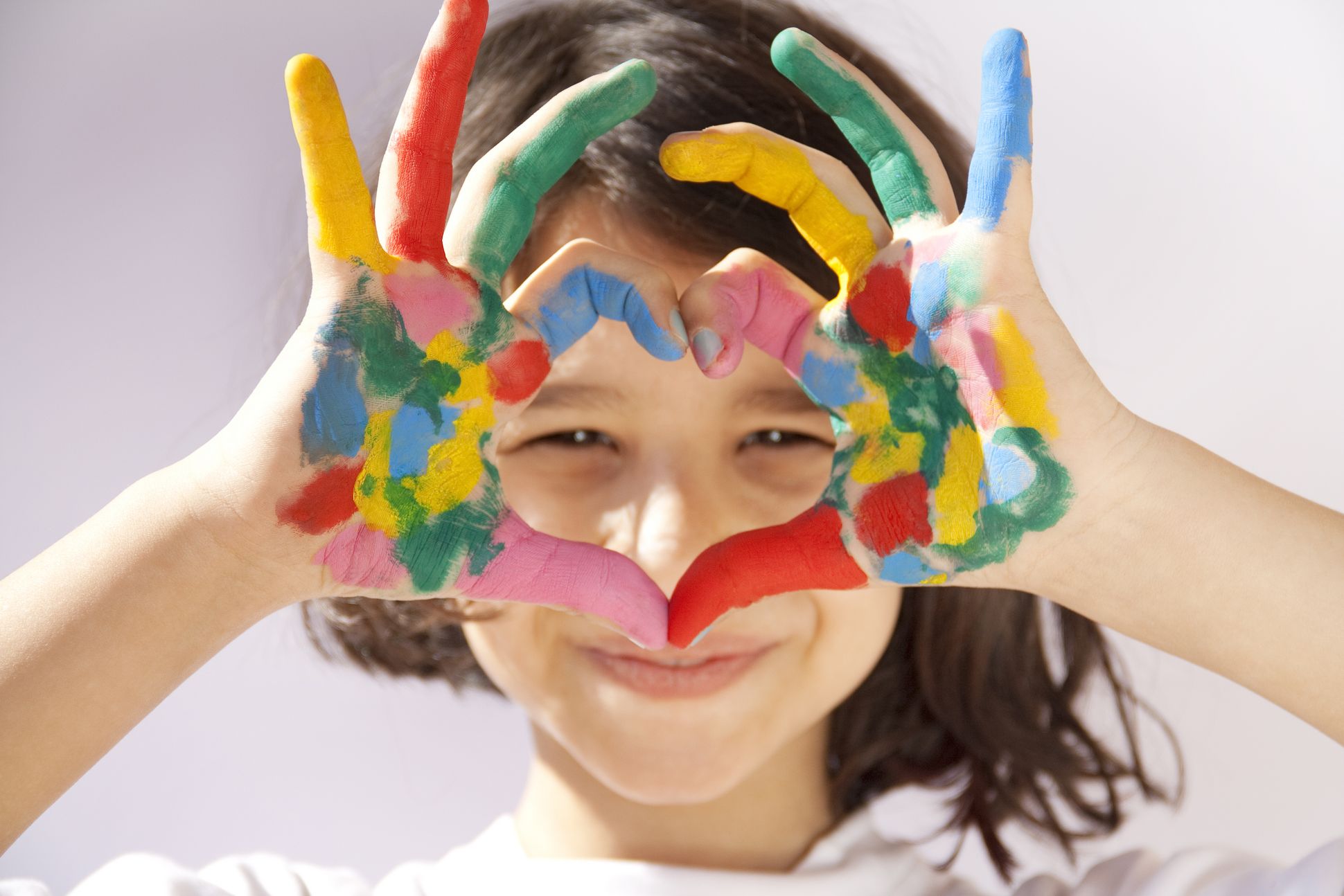 Painted hands sign heart